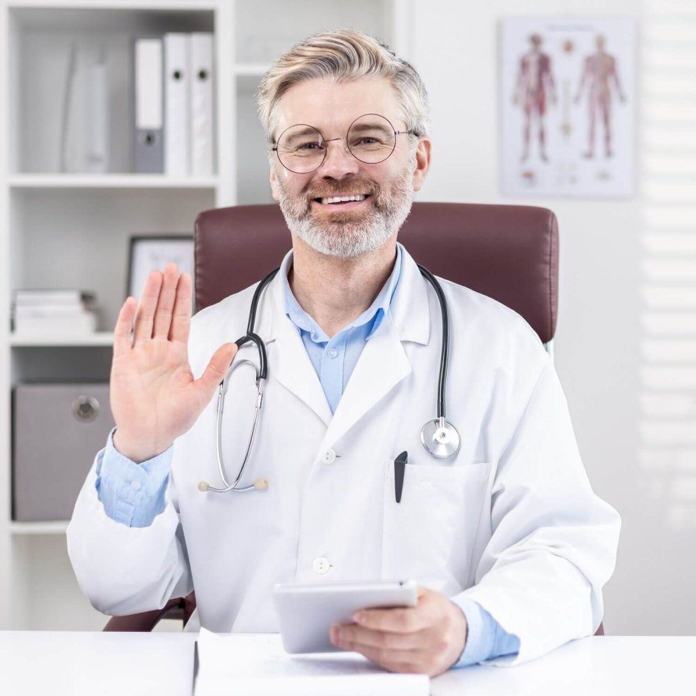 mature-experienced-doctor-with-gray-hair-smiling-2023-11-27-05-15-24-utc-1.jpg