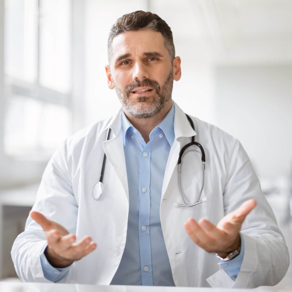 online-doctor-male-physician-giving-consultation-2023-11-27-05-34-11-utc-1.jpg